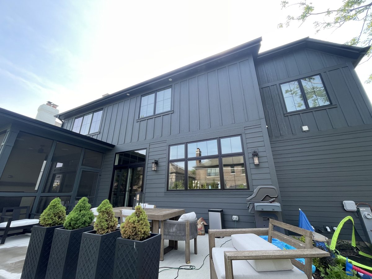 Puffin Panes team cleaning windows at a luxury home